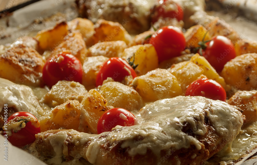 Chicken with potatoes, baked in the oven. Chicken with potatoes, baked in the oven.