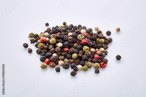 Seasoning - four kinds of pepper peas - isolated on white background