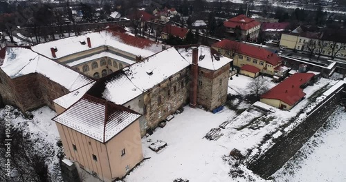 aerial beatiful grimly view on Uzhhorod Castle in winter. photo