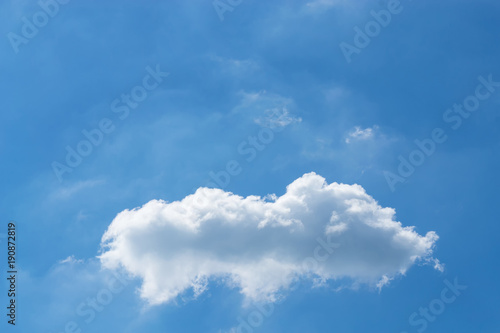 Clouds are divided into layers in the evening with light.