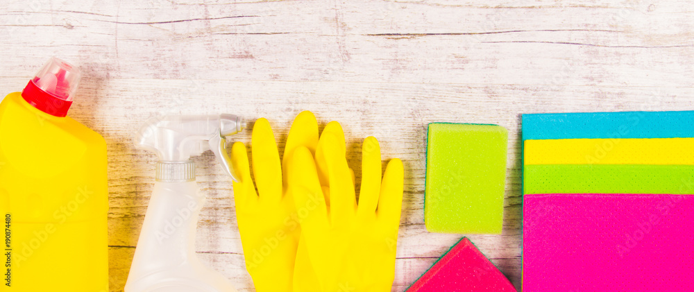 Set of cleaning up stuff on wooden background. Set of cleaning up stuff on wooden background.