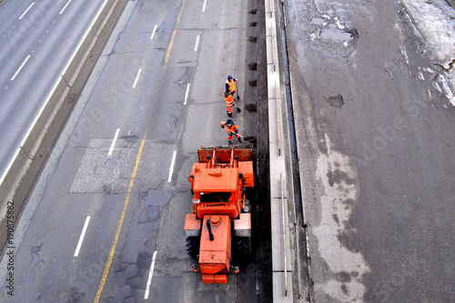 Road works. People working on the road.