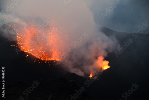 Spectacular eruption of Volcano Stromboli during sunset, Aeolian Islands, Sicily, Italy