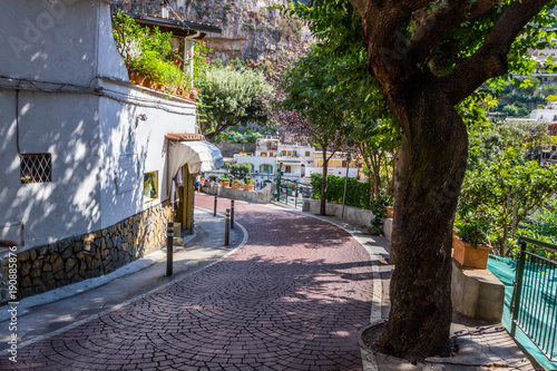 beach streets and colorful houses on the hill in Positano on Amalfi Coast in Italy
