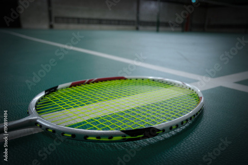 Badminton racket on badminton court With white lines © Oatz