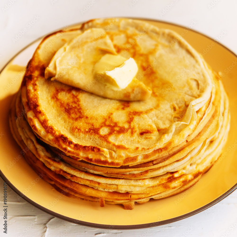 Russian traditional food. Appetizing fried pancakes during Pancake Week