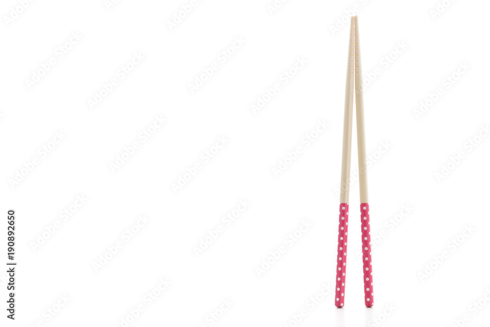 pastel pink chopsticks on a white background
pastel pink chopsticks on a white background