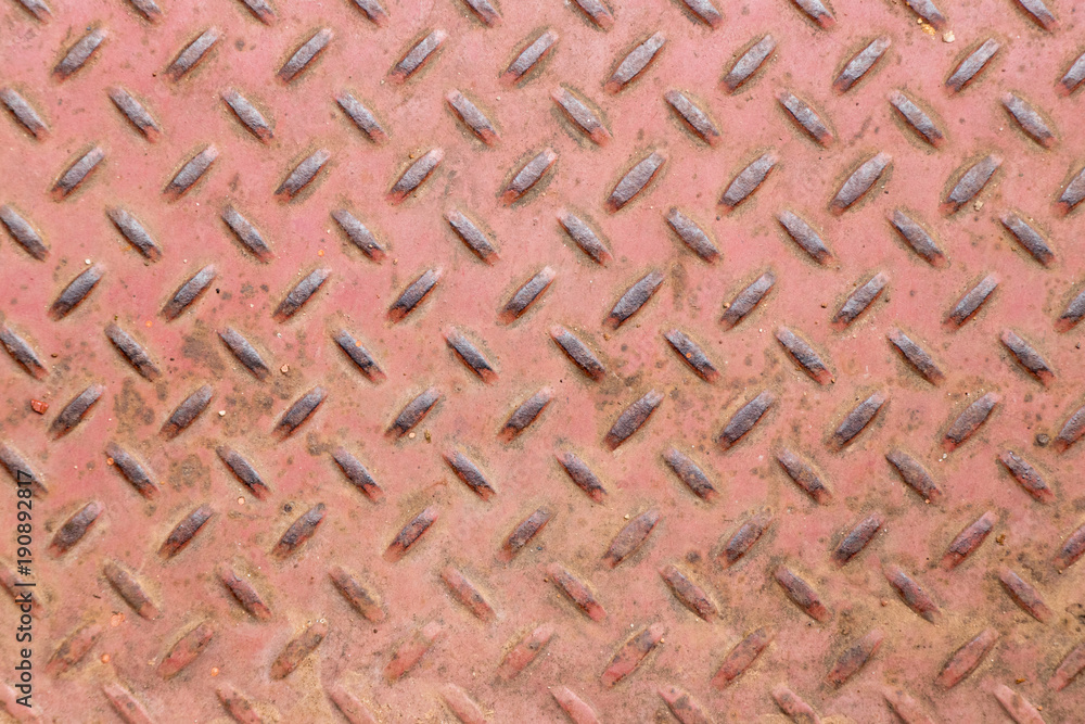 Grunge old red color of diamond shape metal plate textured background Grunge old red color of diamond shape metal plate textured background