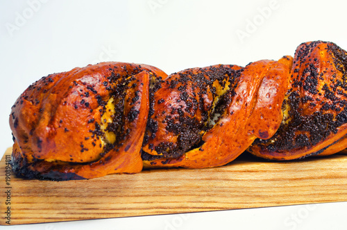 Wallpaper Mural Bun with poppy seeds on white background, isolate, selective focus Torontodigital.ca