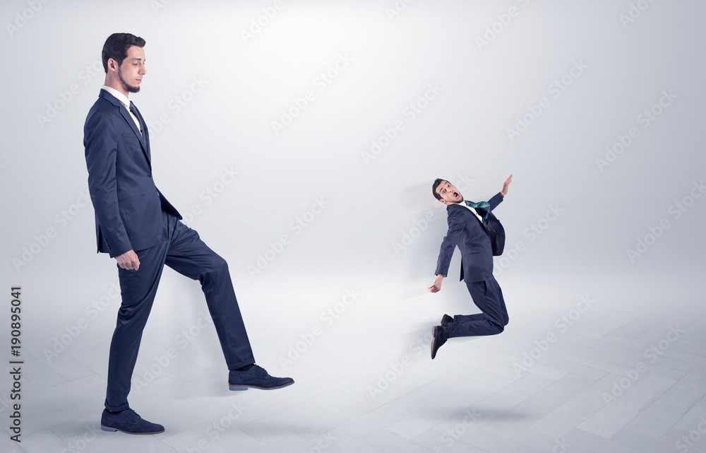 Small man fired by boss with white wallpaper Small man fired by boss with white wallpaper