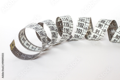 Measuring tape of the tailor for design isolated on white background