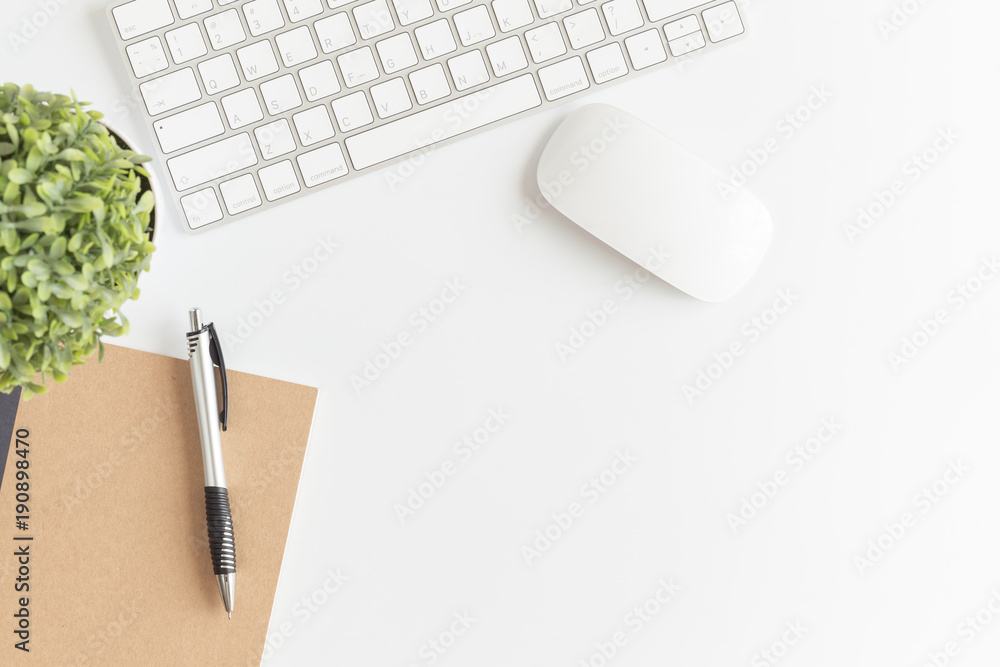 Flat lay photo of office desk with mouse and keyboard,White copy space top view Flat lay photo of office desk with mouse and keyboard,White copy space top view