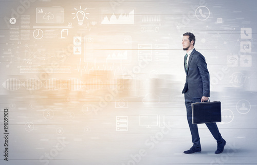 Businessman walking with database concept around