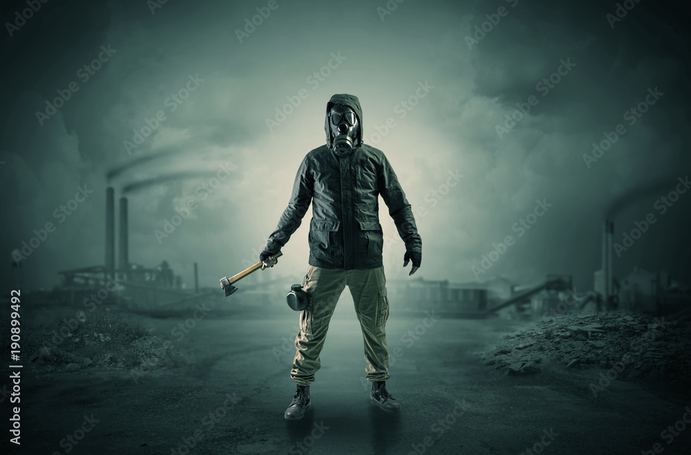 Naklejka premium Gas masked men in demolished environment