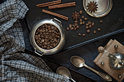 Coffee beans on a black baking sheet