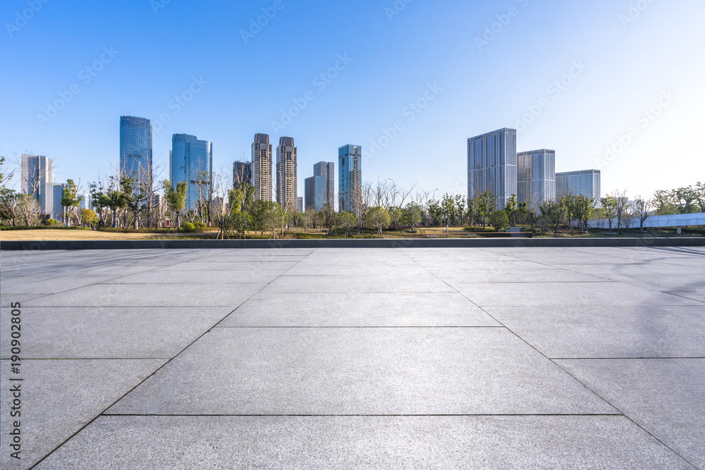 empty marble florr with modern office building empty marble florr with modern office building
