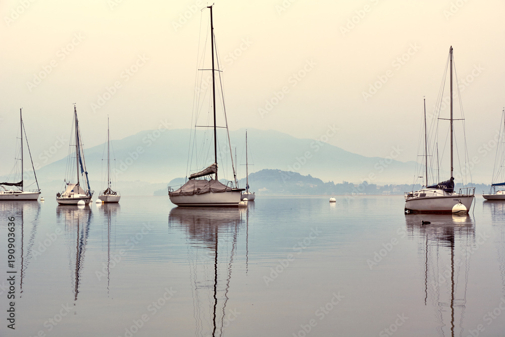 Boats on Lake Lago Maggiore in the morning