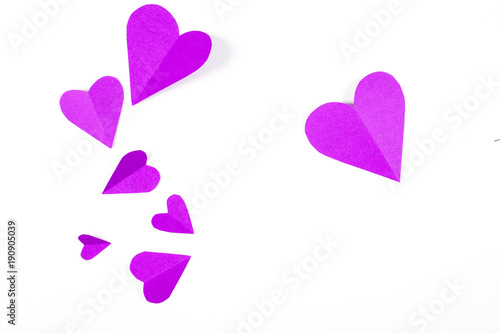 Origami paper heart purple color on white background.