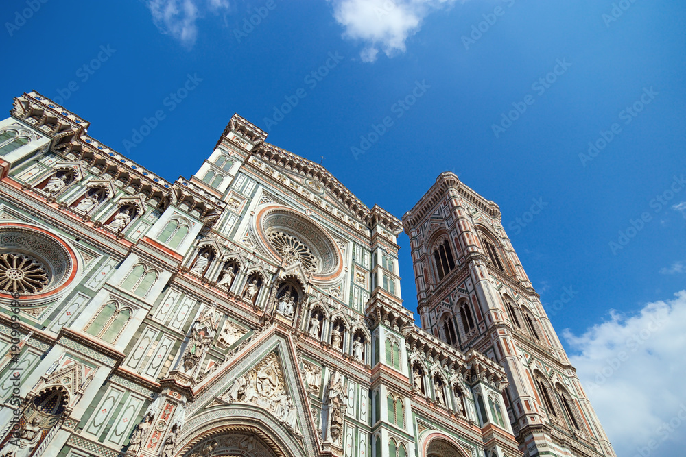 Main facade of Florence Cathedral and bell tower. Italian Gothic architecture. Main church of Florence.  June 2017.