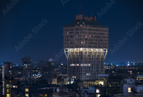 Cityscape of Milan (Italy): The famous skyscraper called Torre Velasca, built in the 50s; night view. photo