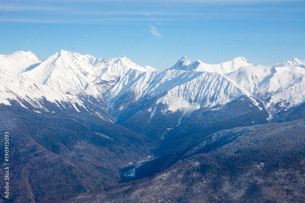 panorama of snow ridge on cloudy background aerial view