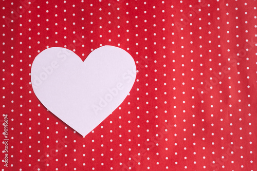 white hearts carved from paper on a red background. Valentine s Day greeting card