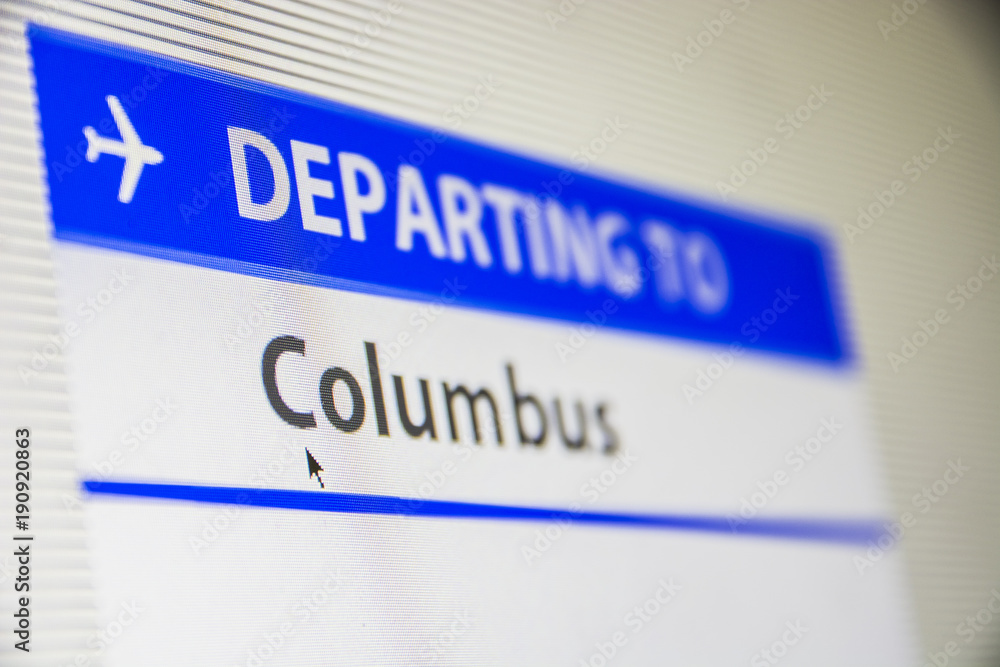 Computer screen close-up of status of flight departing to Columbus, Ohio, USA