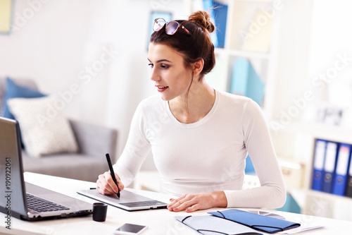 Woman working in her home office