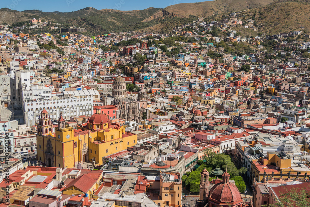 A UNESCO Heritage Site-Guanajuato City, Mexico, from up on a hill, with a view of the Basilica, Guanajuato University, many other buildings and colorful houses