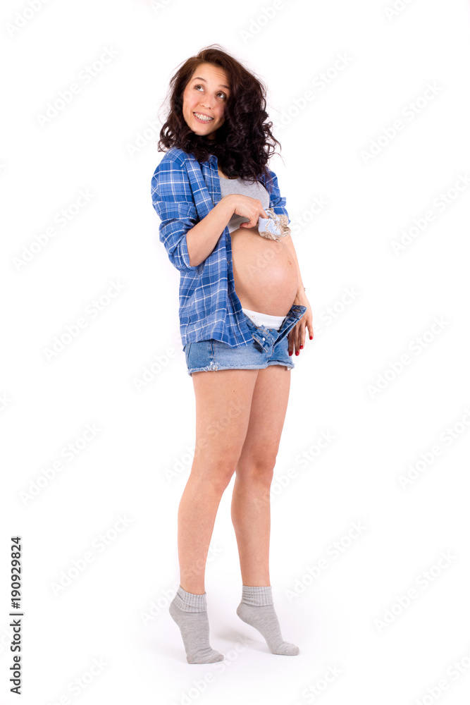 Fototapeta premium Beautiful pregnant girl on white background
