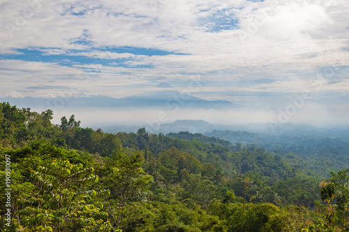 View to Gunung Merapi, Merbabu, Borobudur from Punthuk Setumbu viewpoint near Yogyakarta city, Central Java, Indonesia