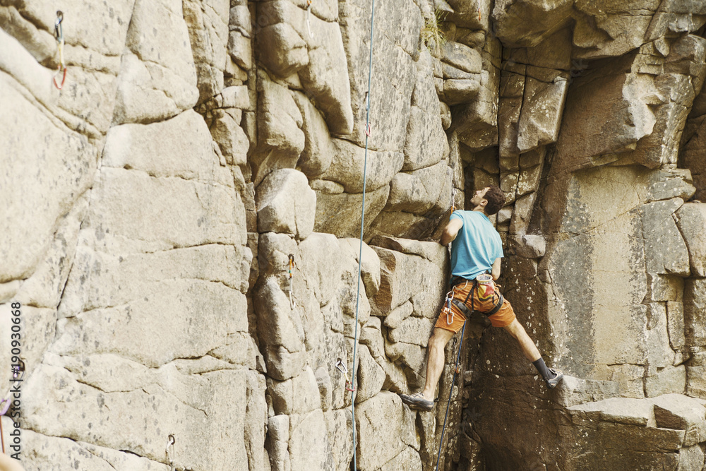 Climber to climb a big wall.Climber to climb a big wall. Climber to climb a big wall.Climber to climb a big wall.