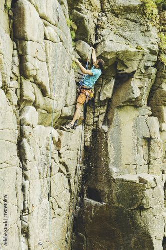 Climber to climb a big wall.Climber to climb a big wall.