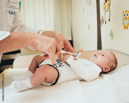 Neurologist diagnosing little boy. Pediatric