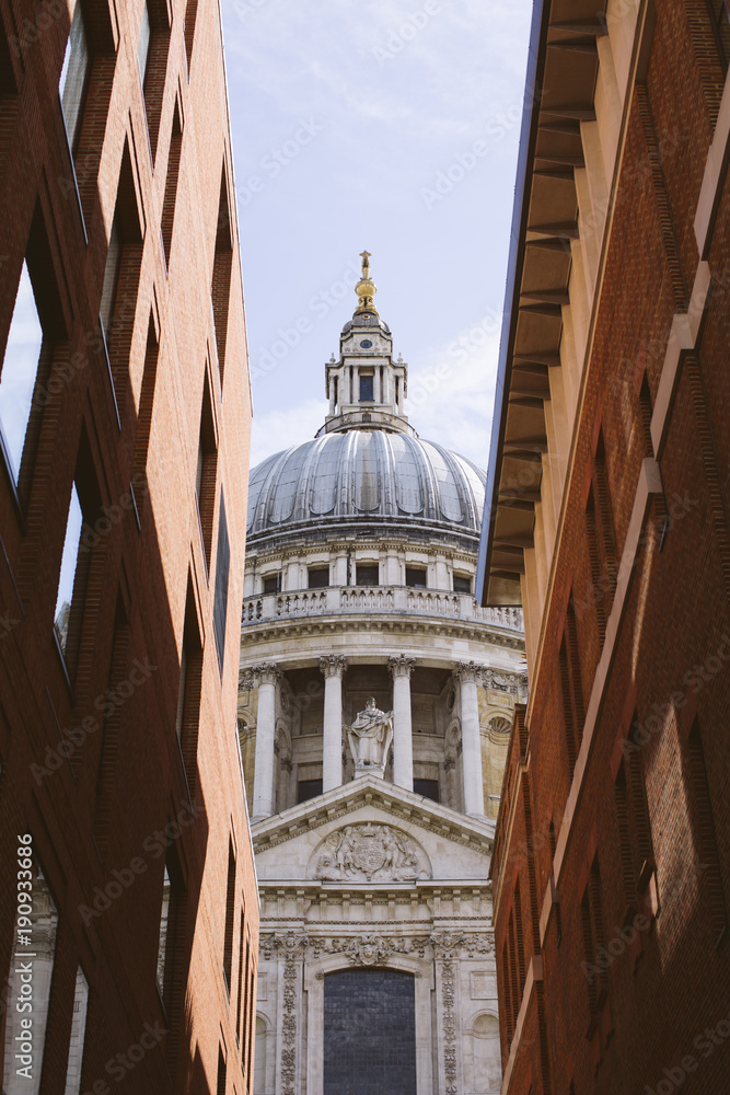 St. Paul`s Cathedral. London. View between two building.