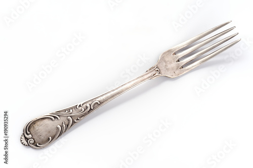 old fork on white background