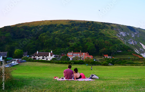 Couple admiring Cornish village