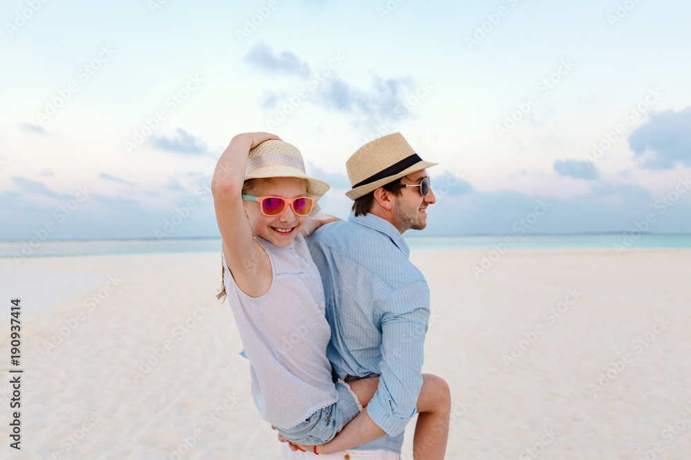 Father and daughter at beach