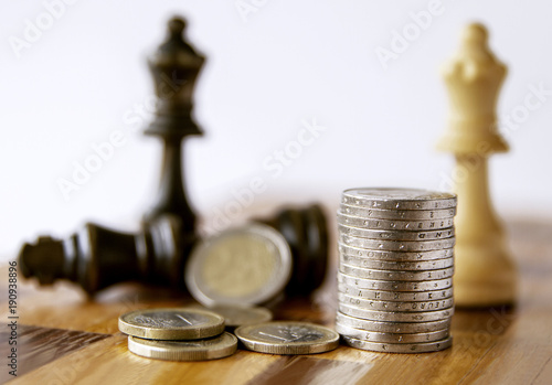 Chess game.  On chess board Money and Chess. Strategy investment with  money. Concept for success. 
