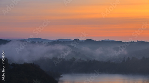Colorful sky and fog at dawn in the Bieszczady Mountains © fotorince