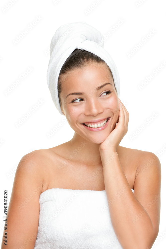 Spa skincare beauty Asian woman drying hair with towel on head after shower treatment. Beautiful multiracial young girl touching soft skin looking away to the side isolated on white background. Spa skincare beauty Asian woman drying hair with towel on head after shower treatment. Beautiful multiracial young girl touching soft skin looking away to the side isolated on white background.