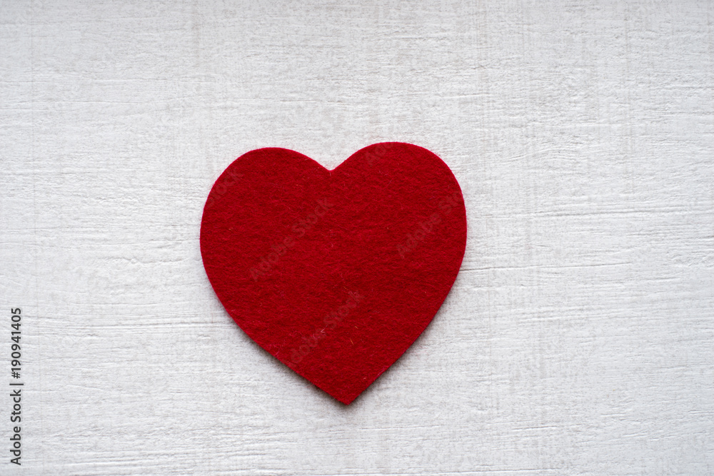 Felt hearts on tile background Felt hearts on tile background