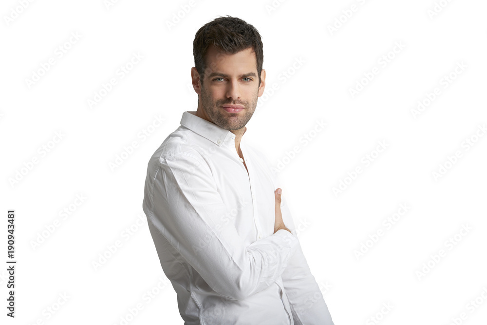 Confident young professional man portrait. Smiling young businessman standing at isolated white background and looking at camera. Confident young professional man portrait. Smiling young businessman standing at isolated white background and looking at camera.