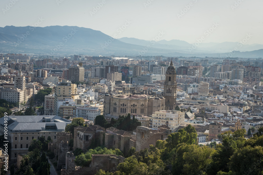Cityscape aerial view of Malaga, Spain. The Cathedral of Malaga is a Renaissance church in the city of Malaga in Andalusia in southern Spain during dusk hour