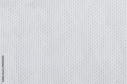 Texture of cool polyester fabric. Background of white textile