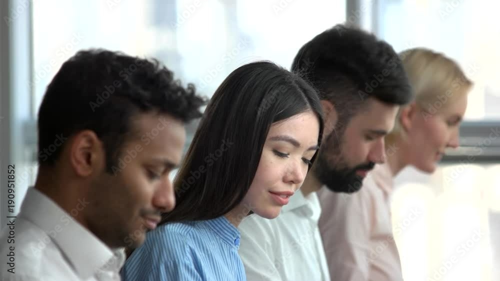 Asian girl obtaining good news by phone. Office girl cheering up because of phone call. Worker distraceted by phone call. Asian girl obtaining good news by phone. Office girl cheering up because of phone call. Worker distraceted by phone call.