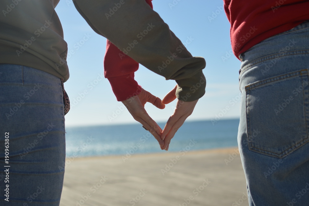 Touching human hands of cheerful people on sunshine beautiful nature outdoors. Lovely valentine harmony, symbolic friendship help. Closeup lifestyle support, dreams holiday freedom travel vacation Touching human hands of cheerful people on sunshine beautiful nature outdoors. Lovely valentine harmony, symbolic friendship help. Closeup lifestyle support, dreams holiday freedom travel vacation