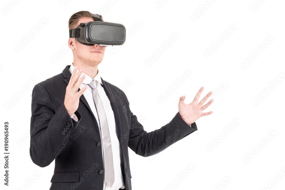 Businessman enjoy with virtual reality glasses isolated on white background Businessman enjoy with virtual reality glasses isolated on white background