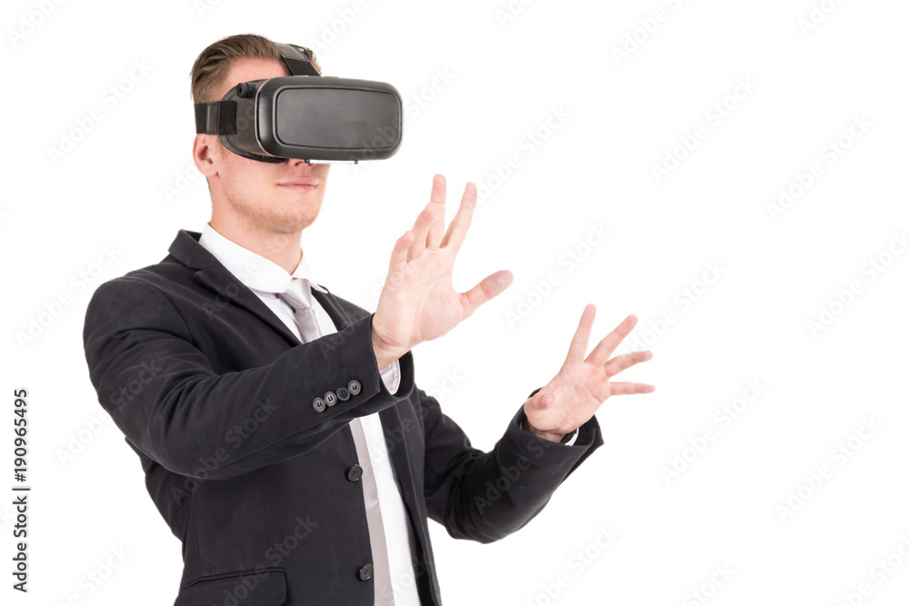 Businessman enjoy with virtual reality glasses isolated on white background Businessman enjoy with virtual reality glasses isolated on white background