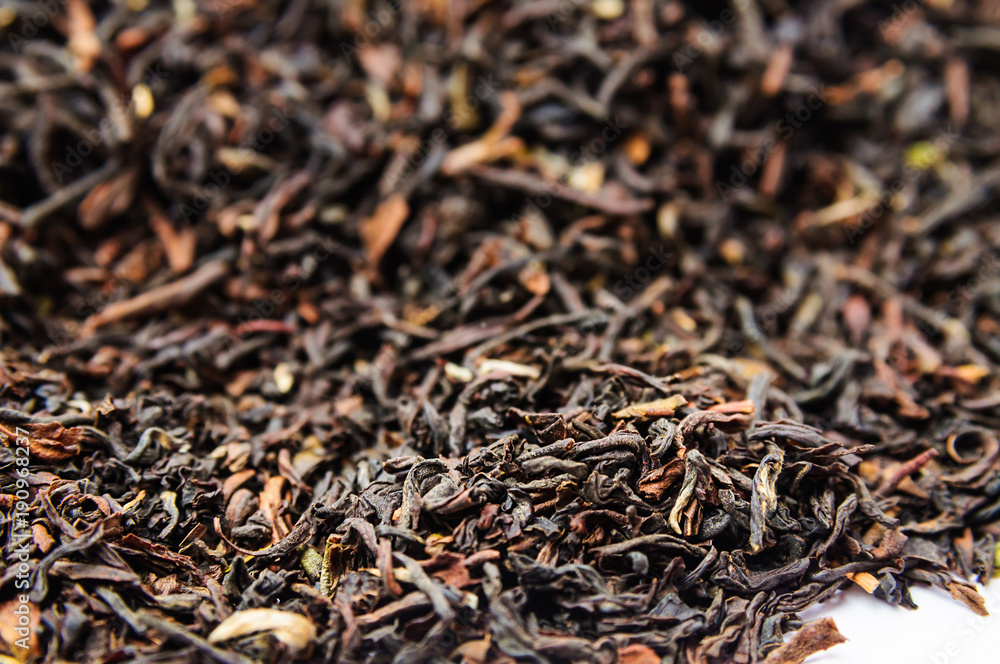 Background of dry black tea with flavors Background of dry black tea with flavors